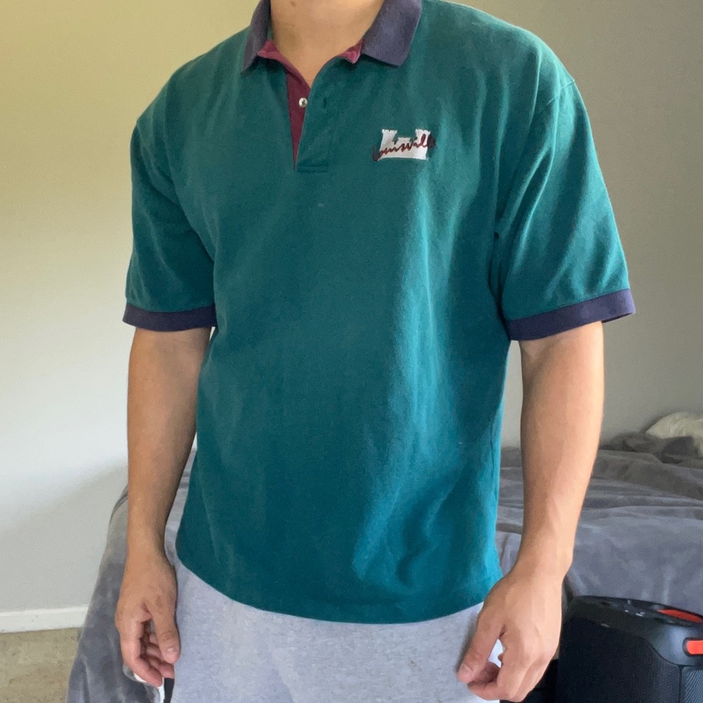 Outer Banks Polo style Shirt w/Louisville embroidered patch.